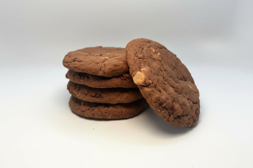 A rich, chocolate cookie loaded with creamy peanut butter chips for the perfect balance of deep chocolate flavor and sweet, nutty goodness. Soft in the center with slightly crisp edges, it's a decadent treat for every chocolate and peanut butter lover.